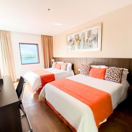 Hotel Royal Elim International Cali Esterno foto A room at the hotel
