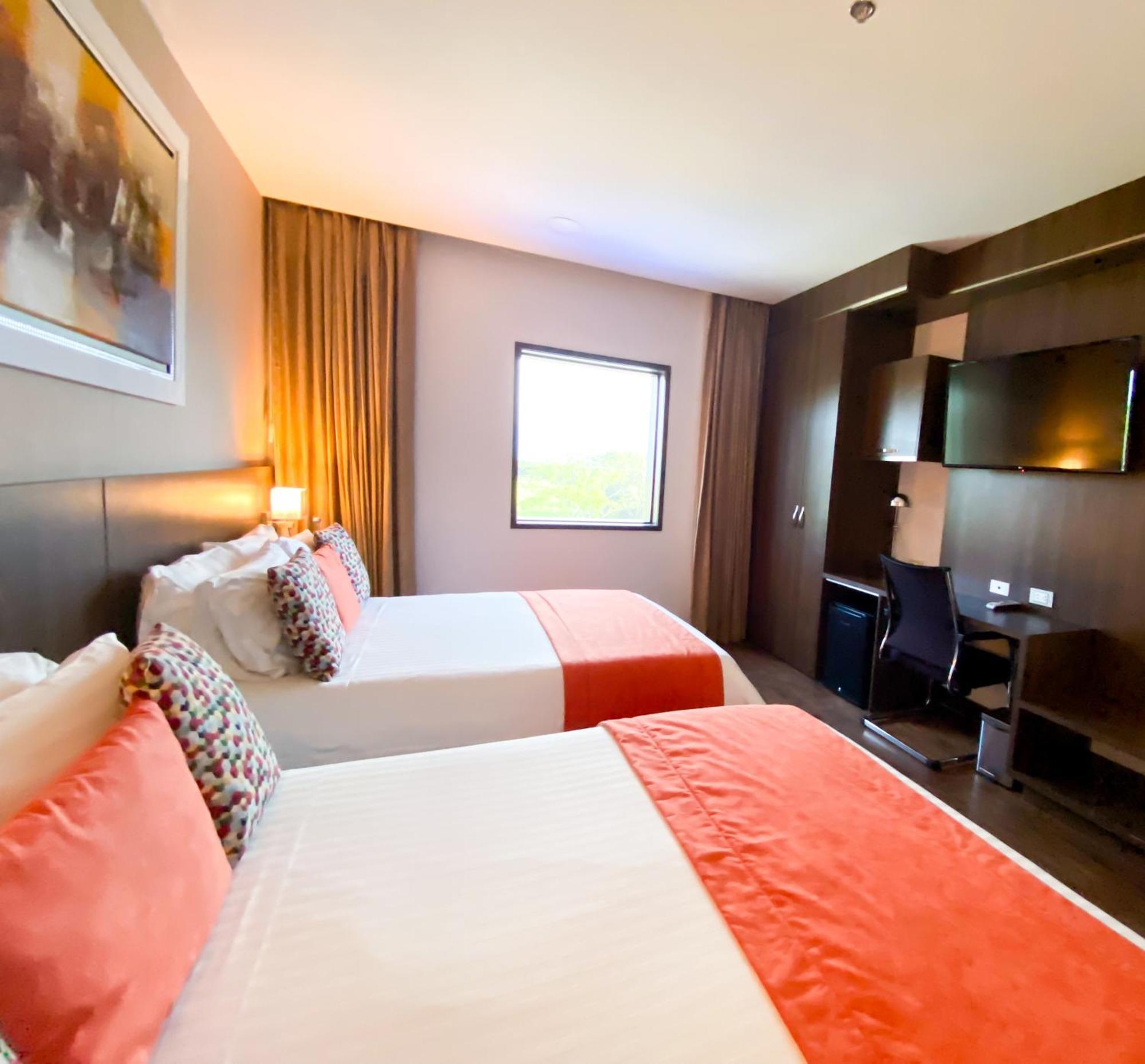 Hotel Royal Elim International Cali Esterno foto A room at the hotel
