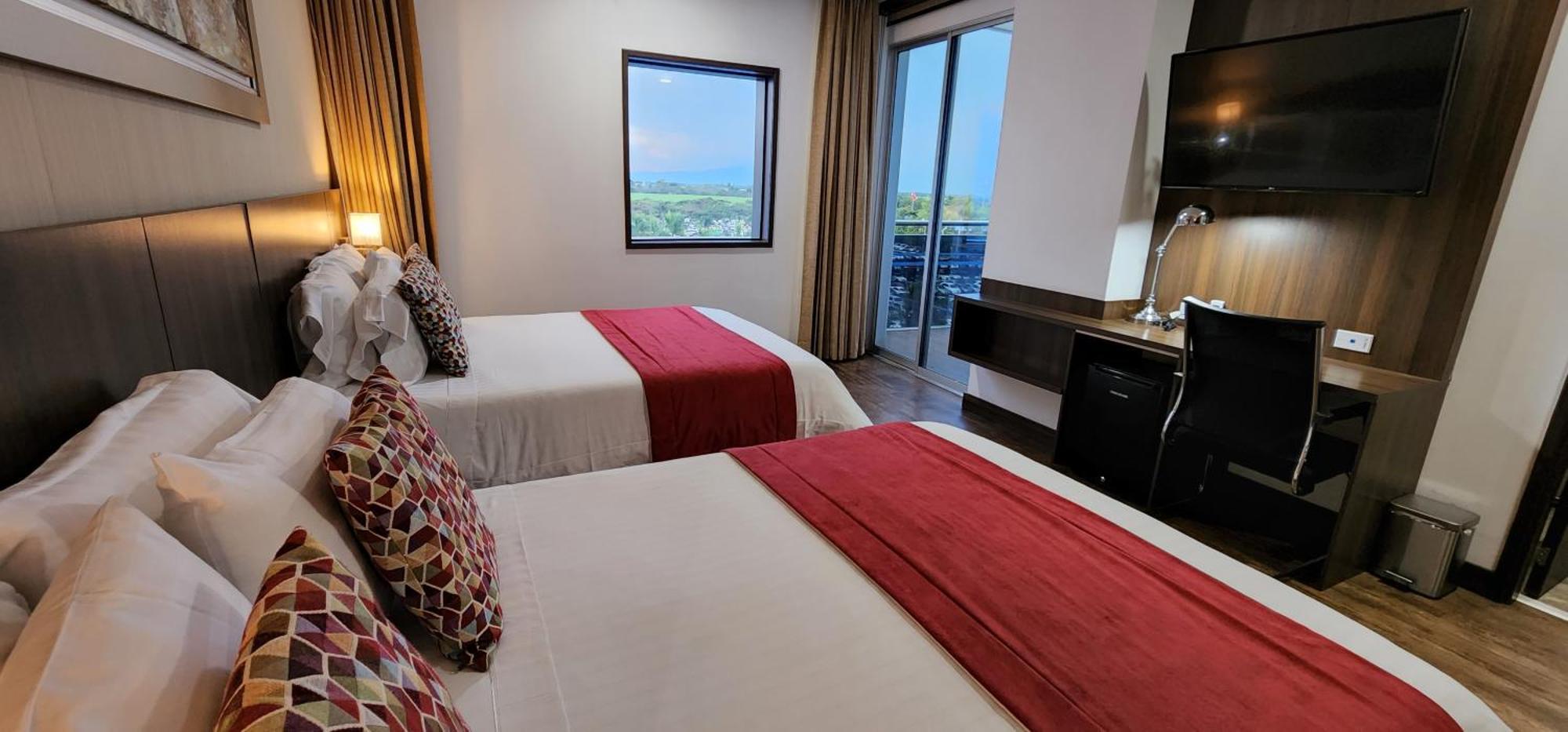 Hotel Royal Elim International Cali Esterno foto A guest room at the hotel