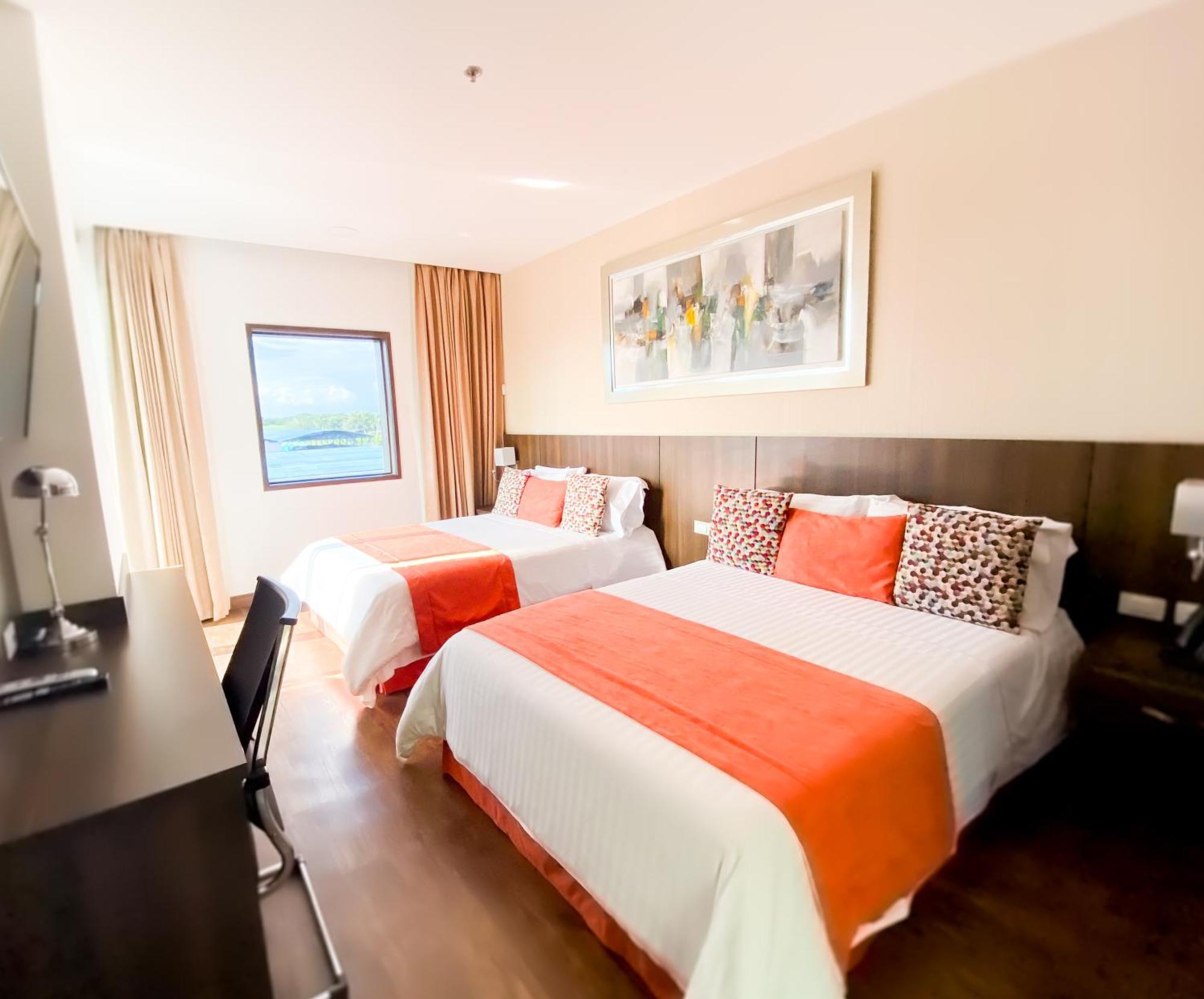 Hotel Royal Elim International Cali Esterno foto A room at the hotel