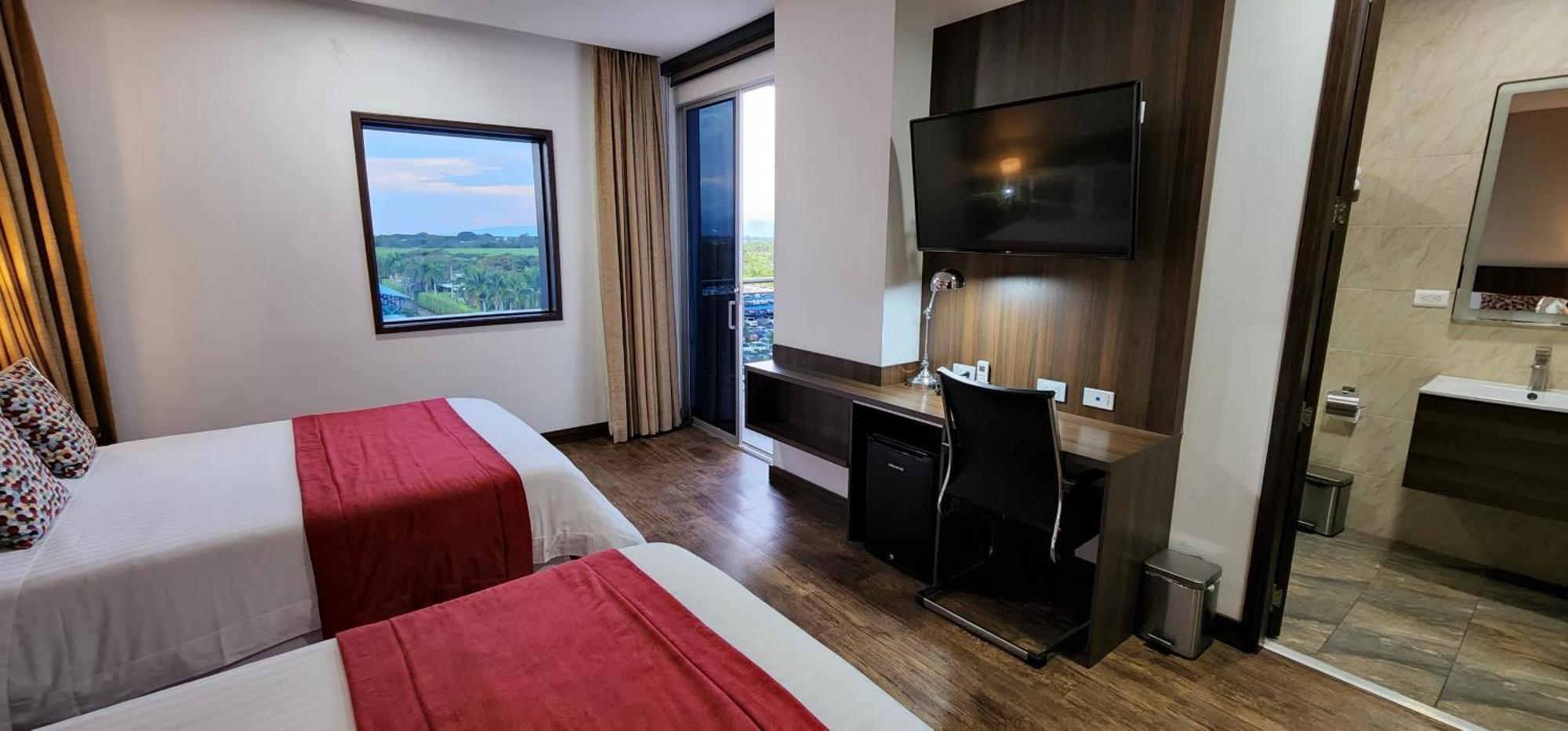 Hotel Royal Elim International Cali Esterno foto A room at the hotel