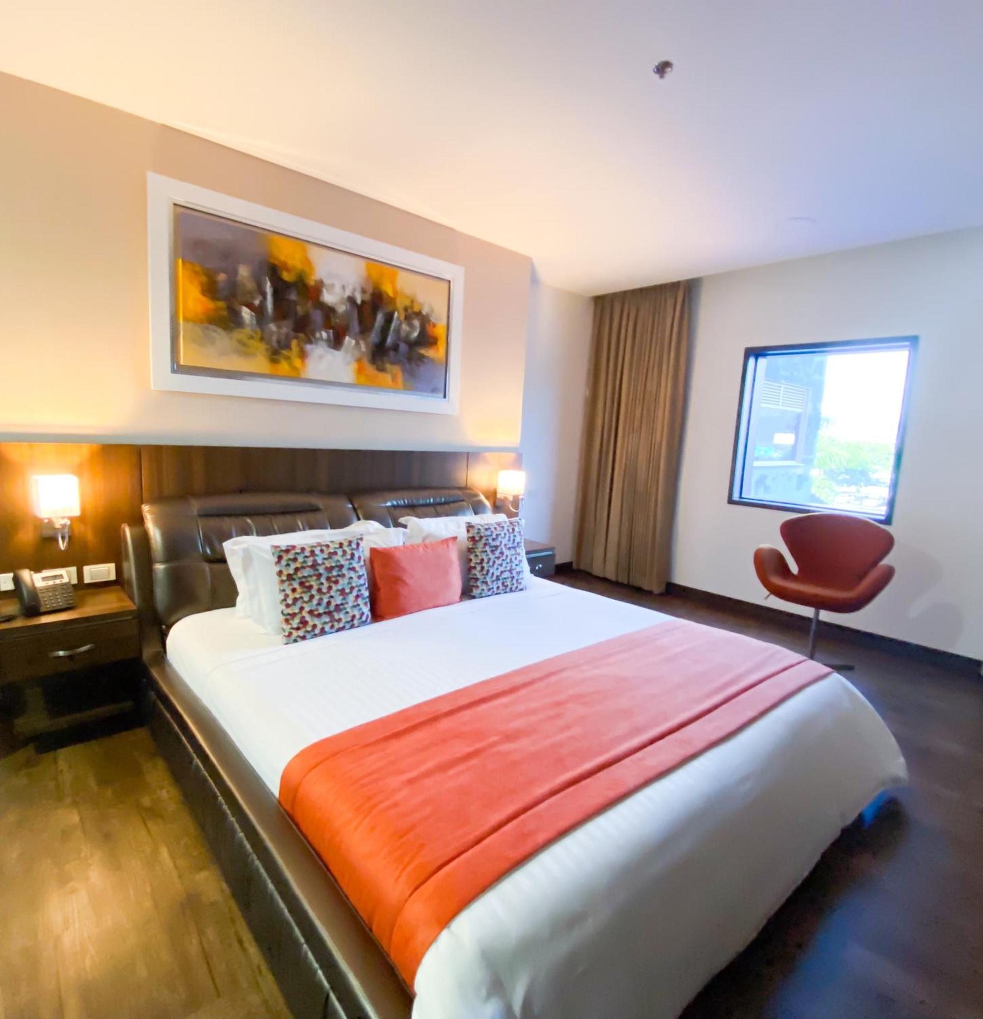 Hotel Royal Elim International Cali Esterno foto A bedroom at the hotel