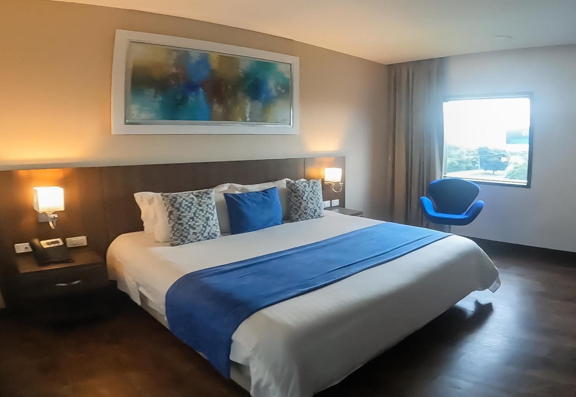Hotel Royal Elim International Cali Esterno foto A room at the hotel