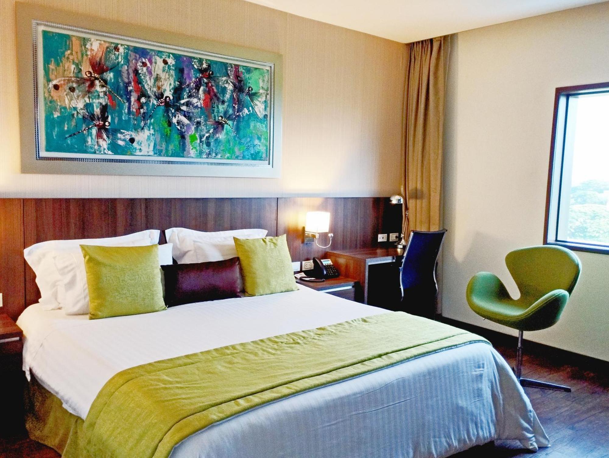 Hotel Royal Elim International Cali Esterno foto A room at the hotel