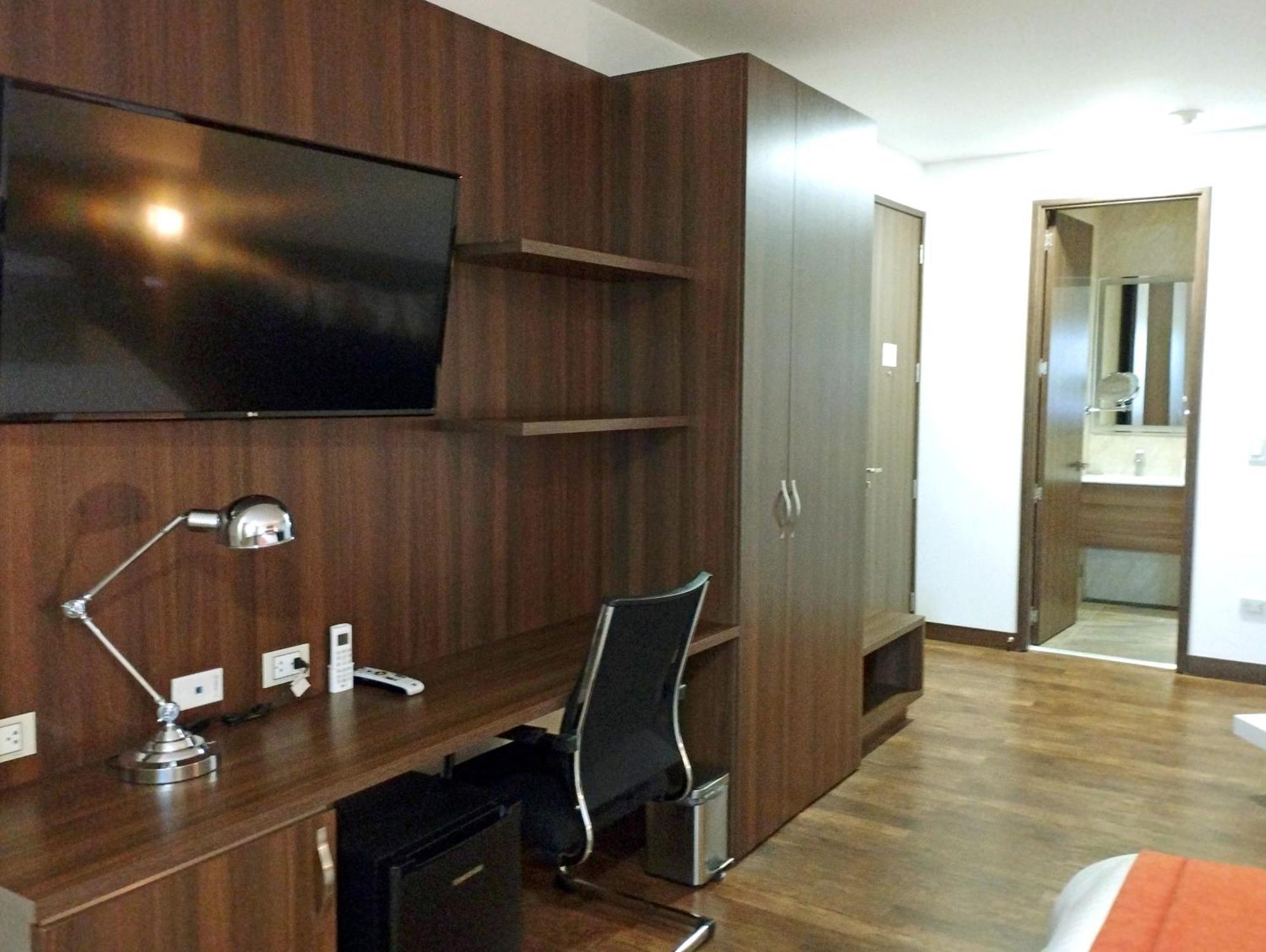 Hotel Royal Elim International Cali Esterno foto A typical bedroom in the halls of residence