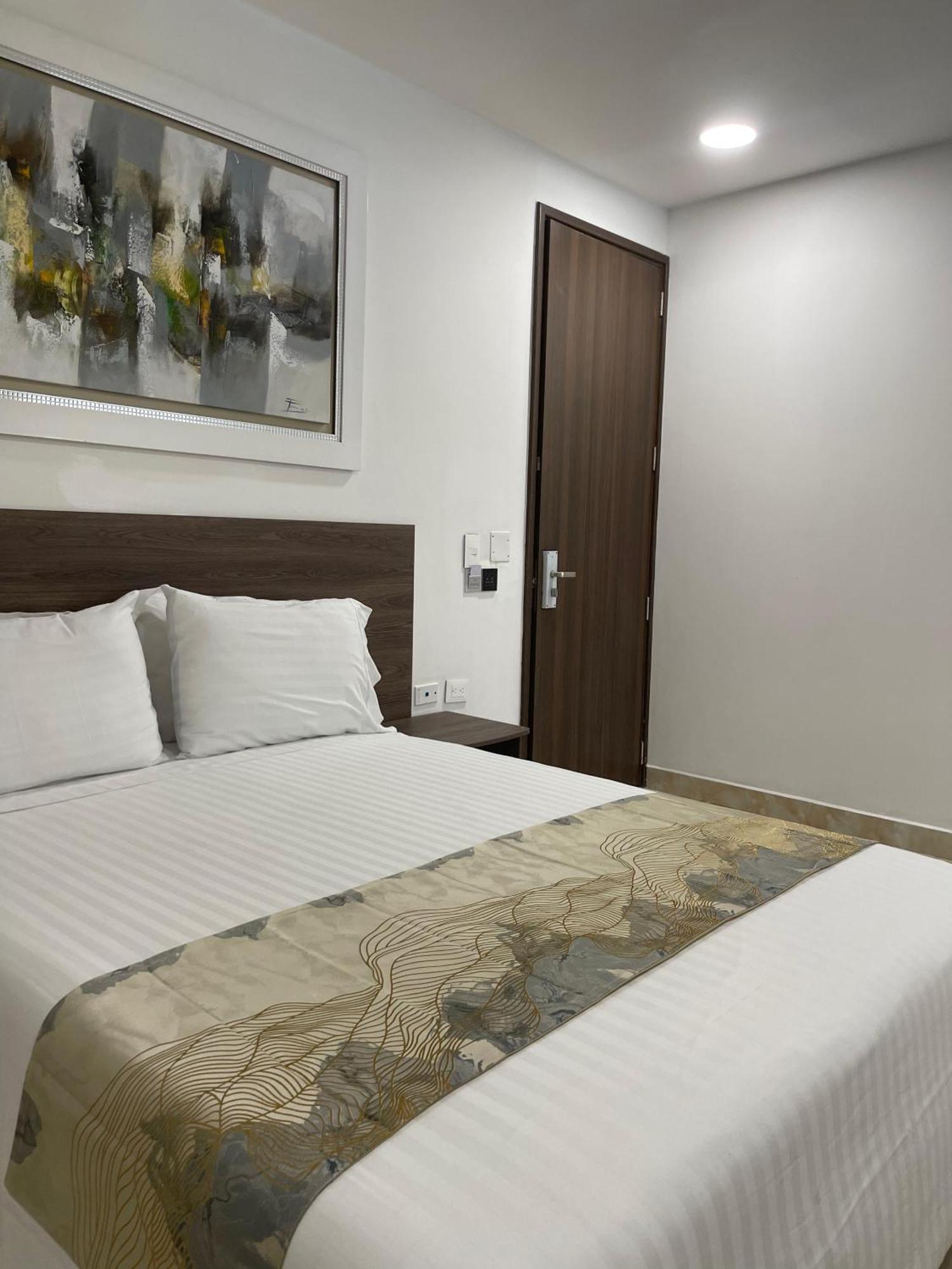 Hotel Royal Elim International Cali Esterno foto A room at the hotel