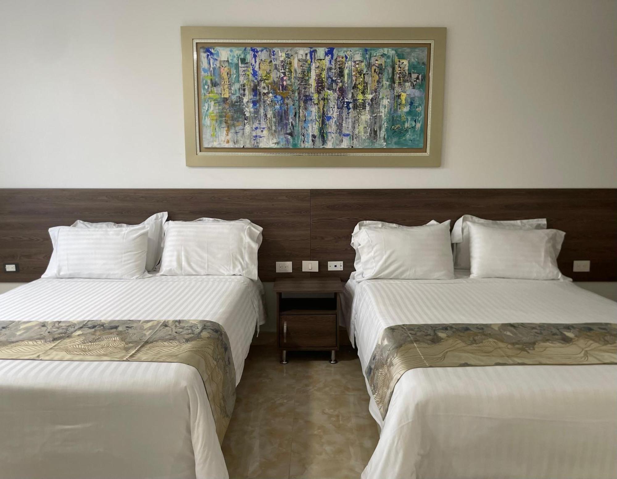Hotel Royal Elim International Cali Esterno foto A room at the hotel